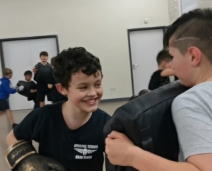 Kids practicing Krav Maga techniques at Bristol Titans